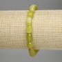 Jadeite faceted bracelet, bead diameter 9-12 × 8 mm, length 18 cm ± stretch