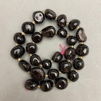 Faceted Garnet Beads, 11–16×10–15 mm, on thread, length about 41 cm