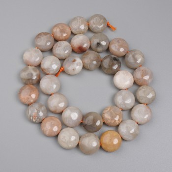 Coin-shaped fossilized coral beads, 11.5 mm diameter, on thread, 38 cm long
