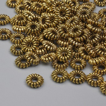 Gold-tone bead insert — 6×2 mm with 2 mm hole; packaging 20 g (~94 pcs)
