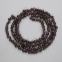 Faceted Garnet Beads, 5–6.5 × 4–5 mm, on thread, length 80 cm+