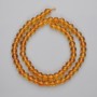 Citrine beads, pressed smooth spheres, 6mm diameter, on a 37 cm strand