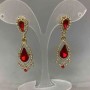 Earrings with red crystals and white rhinestones, gold-tone metal, diameter 16mm, length 47mm.