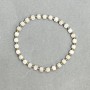 Bracelet with white quartz faceted cubes 4x4 mm and hematite beads 2 mm, length 18 cm, stretch