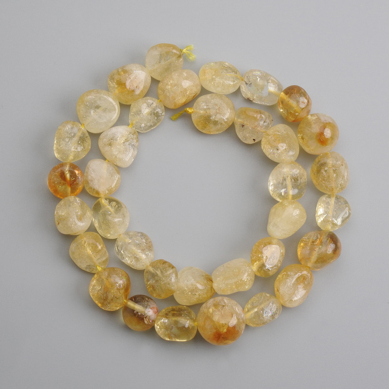 Citrine tumbled beads, diameter 11-13×6-12 mm, length 40 cm