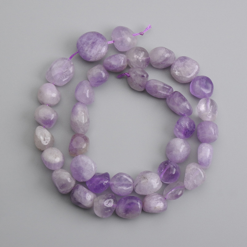 Amethyst faceted beads 10–13 × 10–15 mm ±, 40 cm strand ±