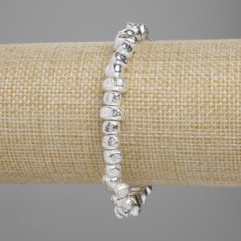 Lava Bracelet with Silver-Plated Metallic Finish, Porous Tumbled Beads 6.5–8.5 × 4–5 mm, Length 18 cm, Stretch