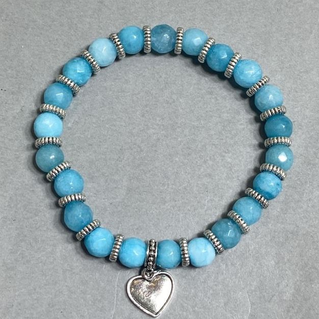 Aquamarine bracelet with faceted 8mm beads, metal inserts, length 18 cm ±, elastic