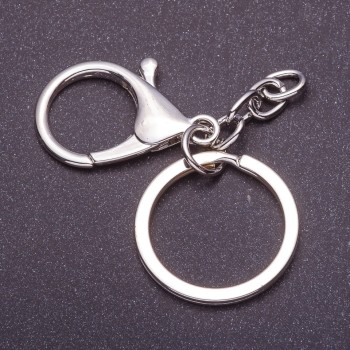 Price per pack / 10 pcs. Keychain base with two attachments: carabiner + ring, diameter 3 cm, length 5 cm