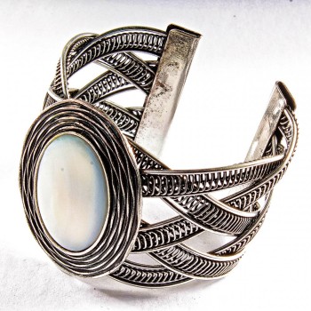 Wide pearl bracelet with metal bezel, oval setting