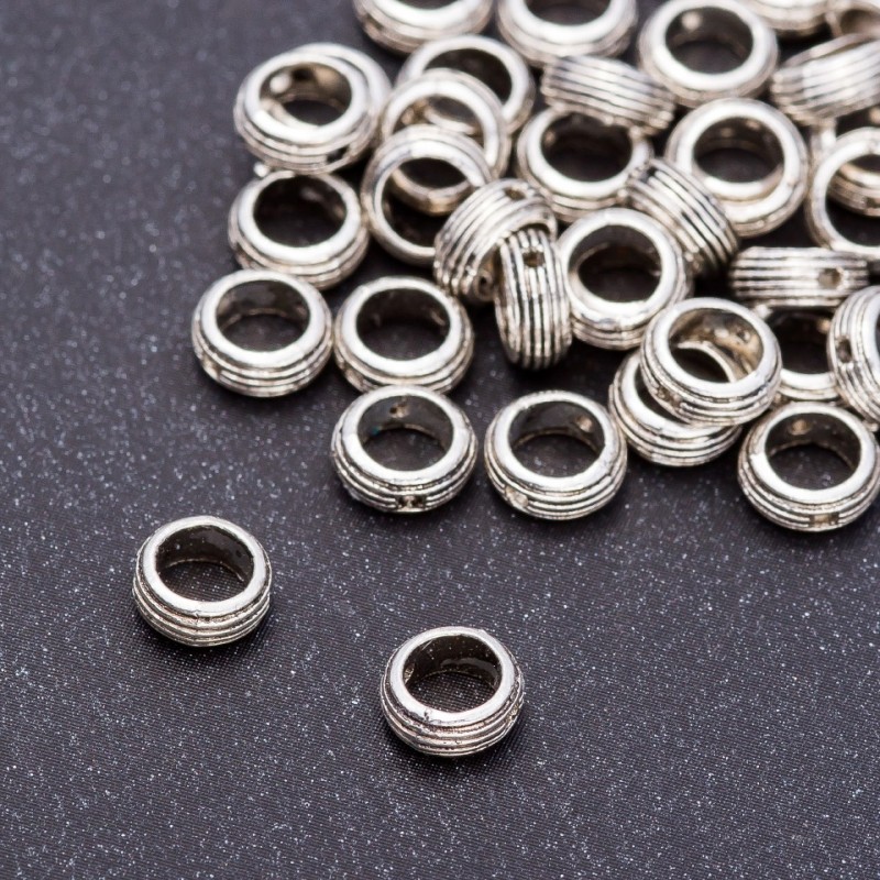 Pandora-style Bead Insert Ring, diameter 7x3 mm, hole 5 mm, packaging 20 g ± 75 pcs