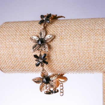 Evening bracelet 'Lilies' with black crystals, antique gold color, width 25mm, length 19-25 cm