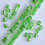 Crystal beads in Swarovski style, light-green with a purple 'Gasoline' coating, diameter 2.5×4 mm, thread length 48 cm