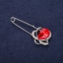 Brooch-pin 'Flower' with white crystals, red stone color, 46x19 mm, silver-colored metal