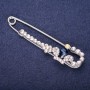 Brooch-pin 'Crown' with blue stone and white crystals, 76x18 mm, silver-tone metal