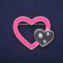 Heart-shaped enamel brooch in black and pink on yellow metal, 45×37 mm