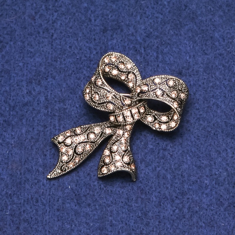 Bow Brooch with Crystals in Gold-Tone Metal 35x53mm