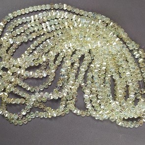 Crystal beads in Swarovski style, yellow transparent, faceted ball with petrol coating, diameter 5x4 mm, thread length 48 cm