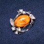 Amber brooch (synthetic) 47x38 mm, yellow color, silver-toned metal