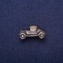 Brooch 'Car' with black enamel and crystals, gold-tone metal 17x29mm