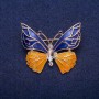 Butterfly Brooch with blue and yellow enamel, white crystal, gold-tone metal 30x36mm