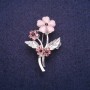Brooch Forget-me-not with pink Cat's Eye stone and rhinestones, silver-toned metal 27×44 mm