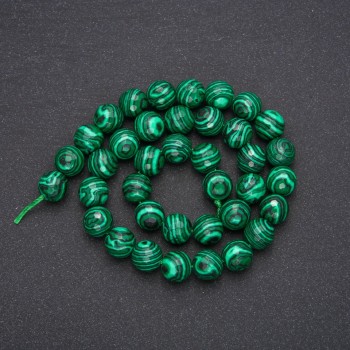 Malachite beads (pressed) faceted ball, diameter 10 mm (+/-), length 38 cm
