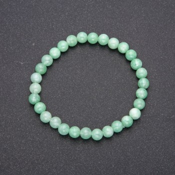 Bracelet made from natural Burmese jadeite on an elastic cord, smooth beads, diameter 6(±)mm, length 18 cm