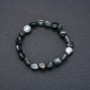 Bracelet made of natural Hawk's Eye stone on elastic cord, faceted, 10x12 mm diameter (±), 18 cm circumference