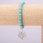 Turquoise bracelet on elastic, diameter 8(±)mm, length 18 cm with inlays and Tree pendant