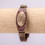 Bracelet with metal inserts, length 16–24 cm, thickness 20 mm, brown eco-leather strap