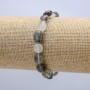 Elastic bracelet of natural stone, Rutilated quartz (Hair quartz) with faceting, 8x9 mm diameter, 18 cm length +