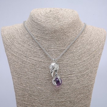 Pendant "Bird with a Ball" 47x18 mm on a chain, length 70 cm +/- silver-tone metal