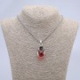 Pendant 'Ball in paw' red 42x22mm on chain, length 70 cm; silver-colored metal