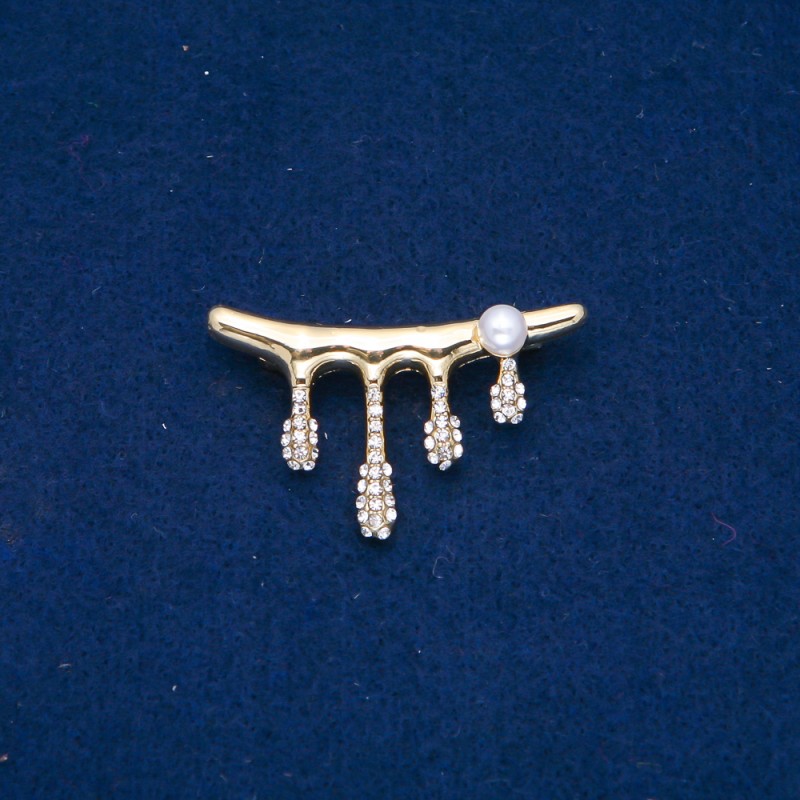 Brooch in golden metal, white crystals and bead 43×28 mm +