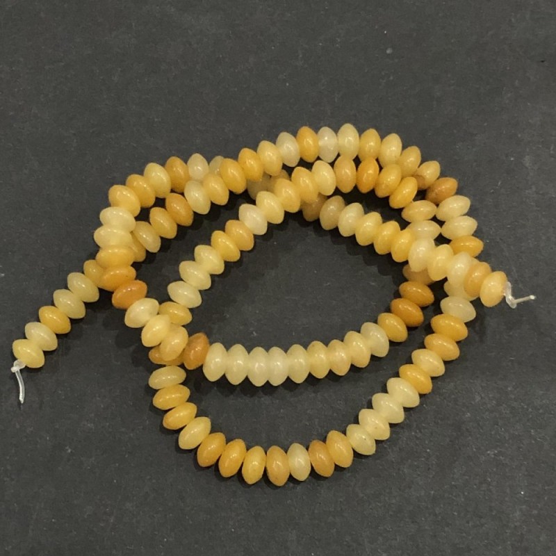 Beads on a thread of natural stone: Yellow agate, smooth rondelle, 6x3mm diameter, 39 cm length