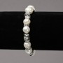 Elastic bracelet with freshwater pearls, silver-tone inserts, and rhinestones, diameter 8-10 mm, length 18 cm