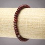 Elastic bracelet of natural red jasper with smooth rondelles, diameter 6x3 mm+