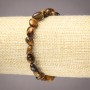 Elastic bracelet with natural Tiger's Eye, faceted, 6x8 mm diameter