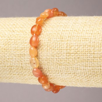 Elastic bracelet of natural carnelian, faceted, 9×7 mm diameter