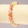 Elastic bracelet with natural orange agate — smooth bead, 8.5 mm diameter+