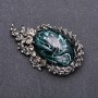 Brooch with gray crystals and emerald cabochon 64×38 mm gray metal