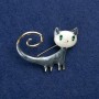 Brooch 'Kitty' in golden metal, enamel and crystals 44x32mm +