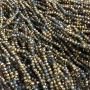 Beads Czech Crystal on fishing line assorted gray and transparent with golden coating, faceted rondelle, diameter 3×2.5 mm, length 36 cm