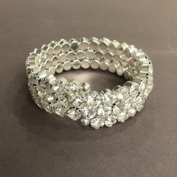 Spiral bracelet with three turns, white crystals, circumference 18-22 cm +