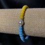 Elastic bracelet with Czech crystal and acrylic 'Ukraine' faceted rondels, diameter 6x4 mm, length 18 cm
