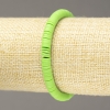 Elastic bracelet with round flat beads made of polymer clay, lime green, diameter 6x1 mm+-, length 18 cm+-
