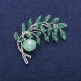 Brooch Twig with nephrite bead, green enamel and crystals, silver-toned metal 44x52 mm