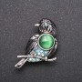 Brooch 'Bird' with blue crystals 'Chameleon' metal color 'Gray' 40x25mm