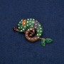 Brooch Chameleon, golden metal with gasoline-toned rhinestones 63×35 mm +